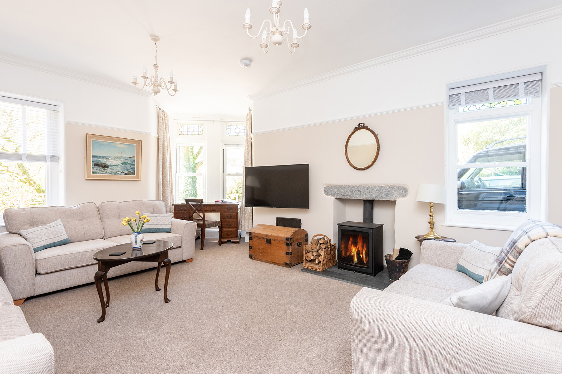 Beautiful Lounge with modern comfortable sofa's, woodburner, desk, Smart TV.