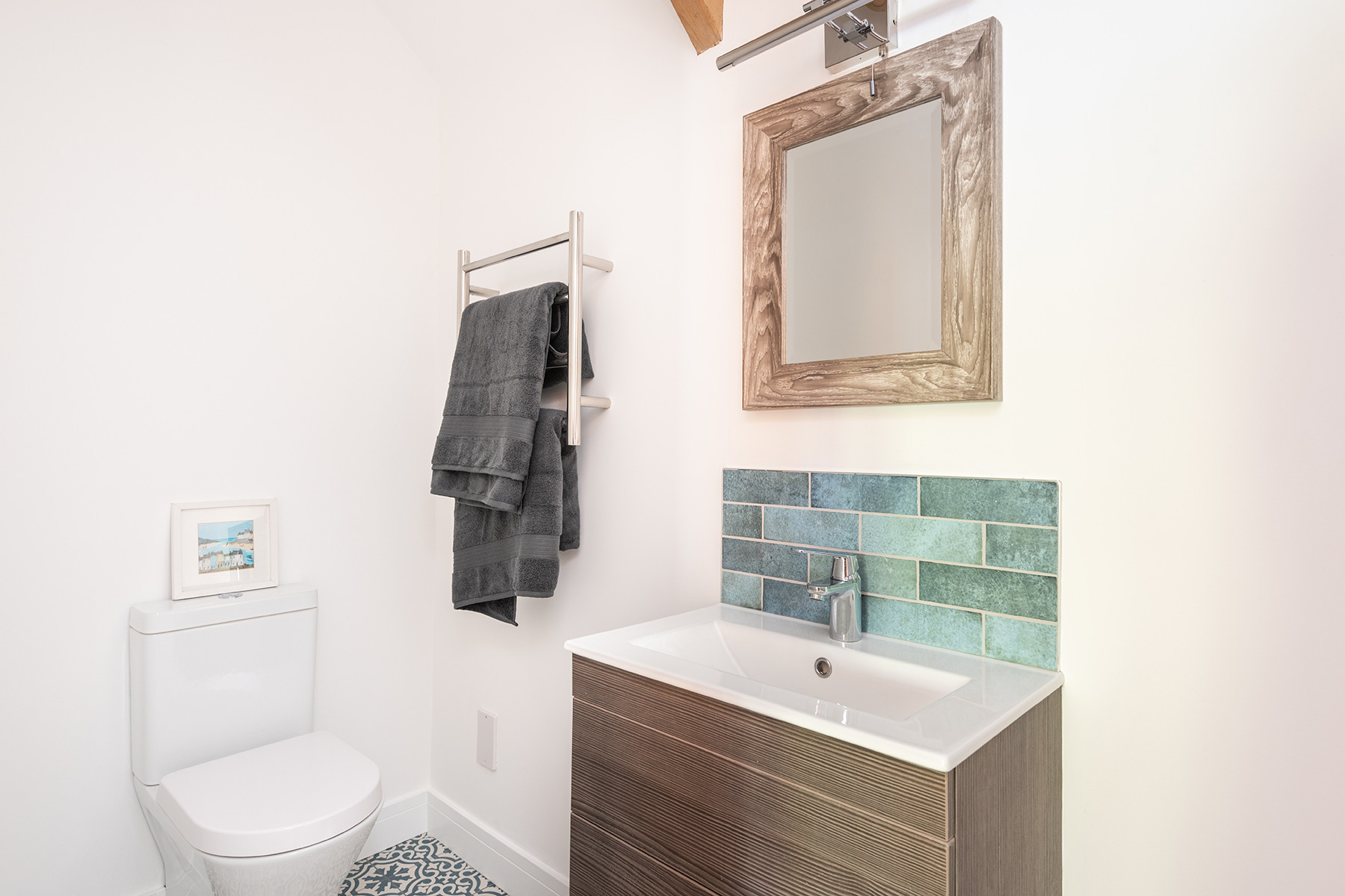 The ensuite bathroom to bedroom one.