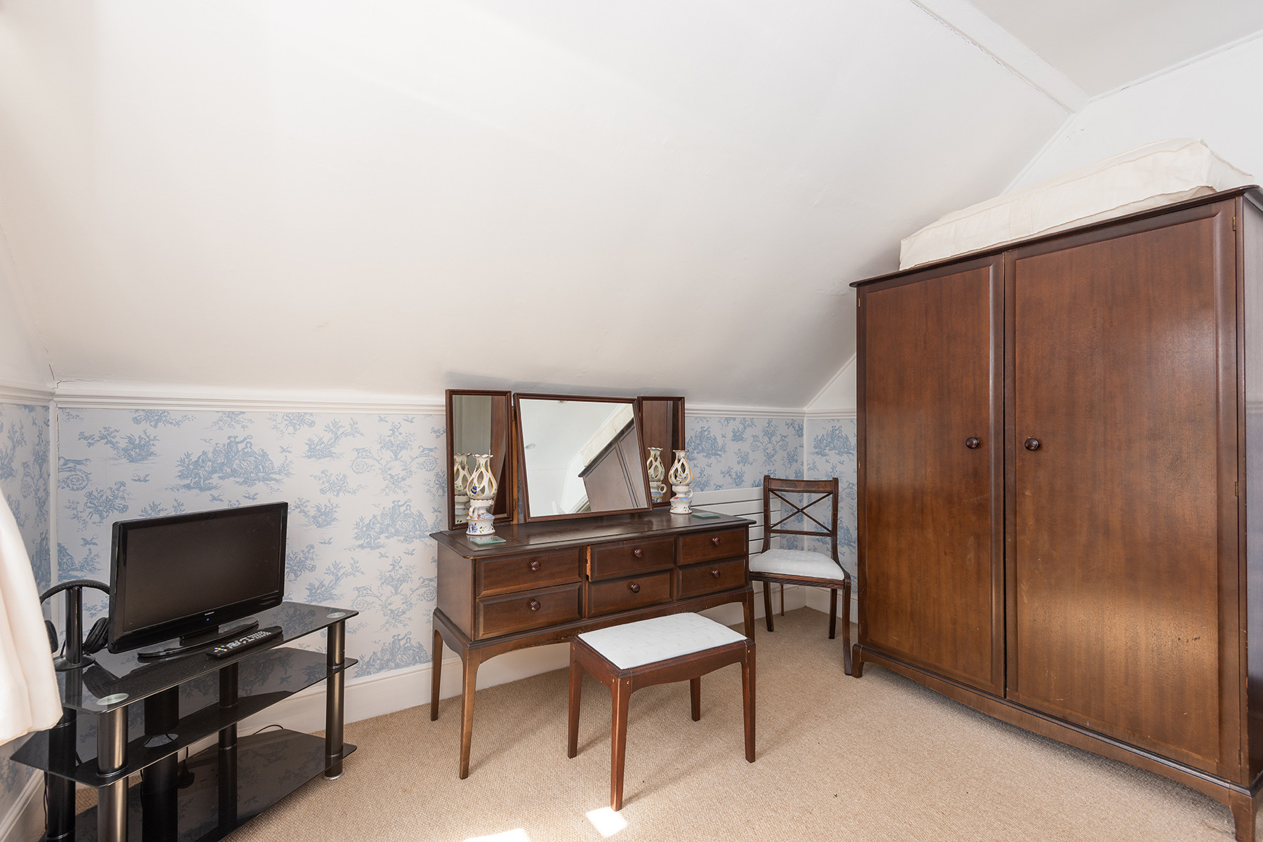 Another view of bedroom one.