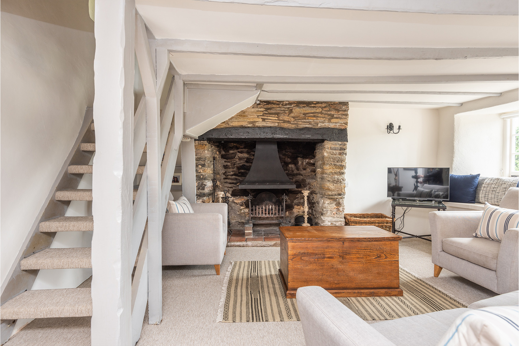 The very comfortable lounge, with open tread stairs. 