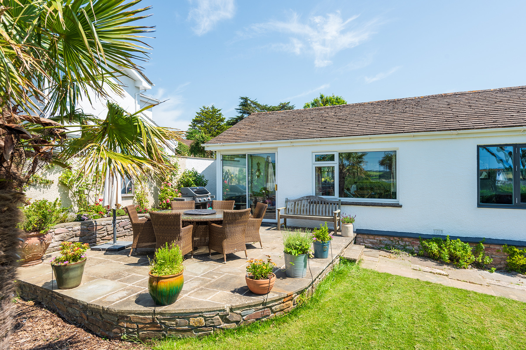 The lovely terrace to relax while the children play