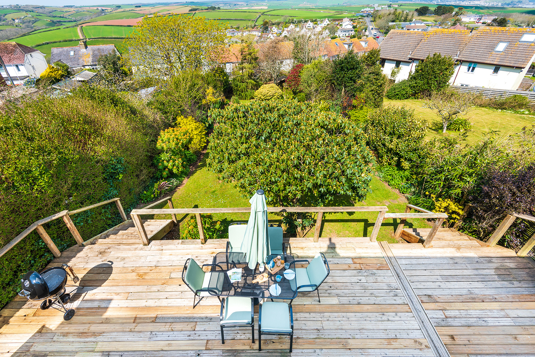 View from balcony to rear decking and garden