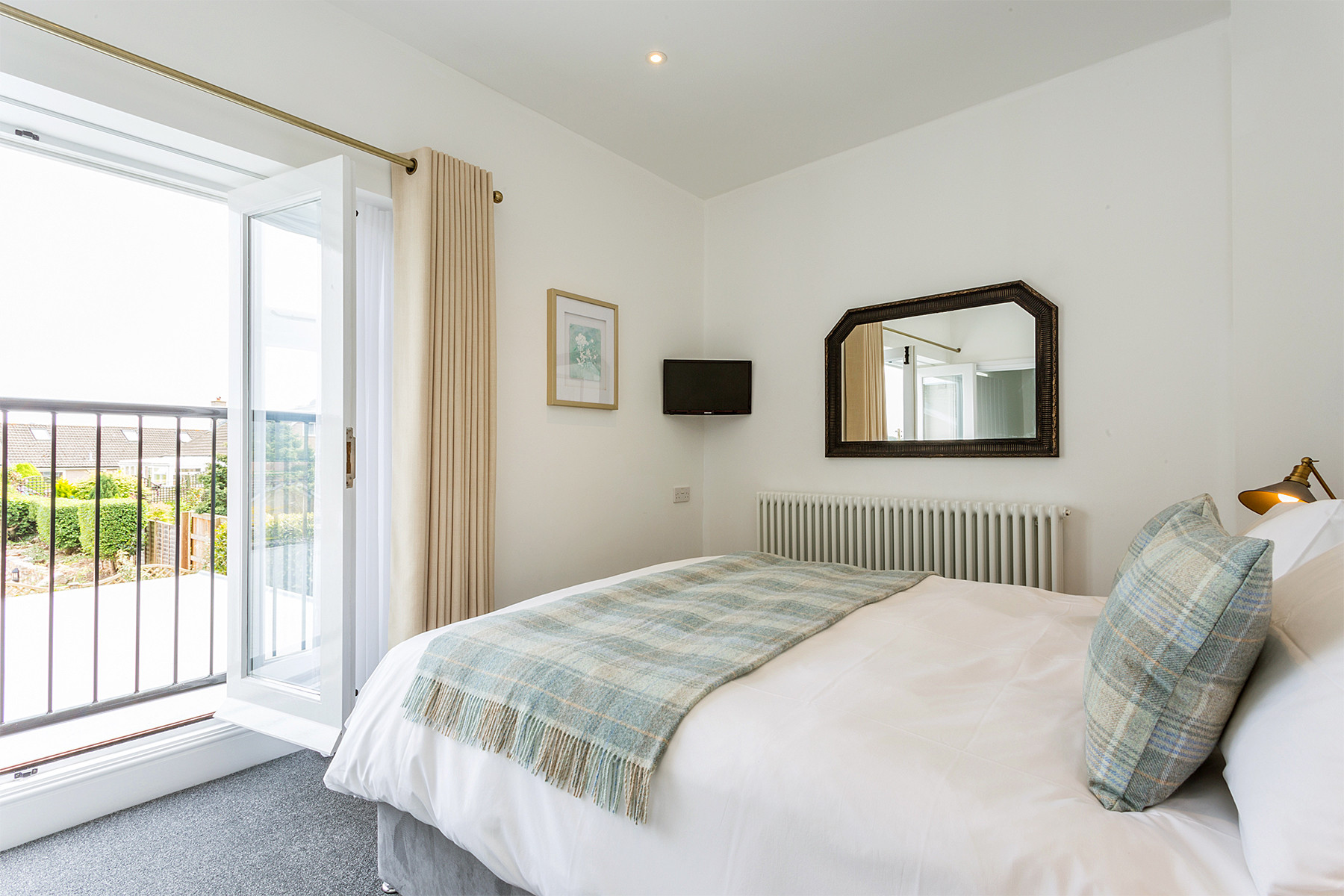 Master bedroom with Juliette balcony and countryside views