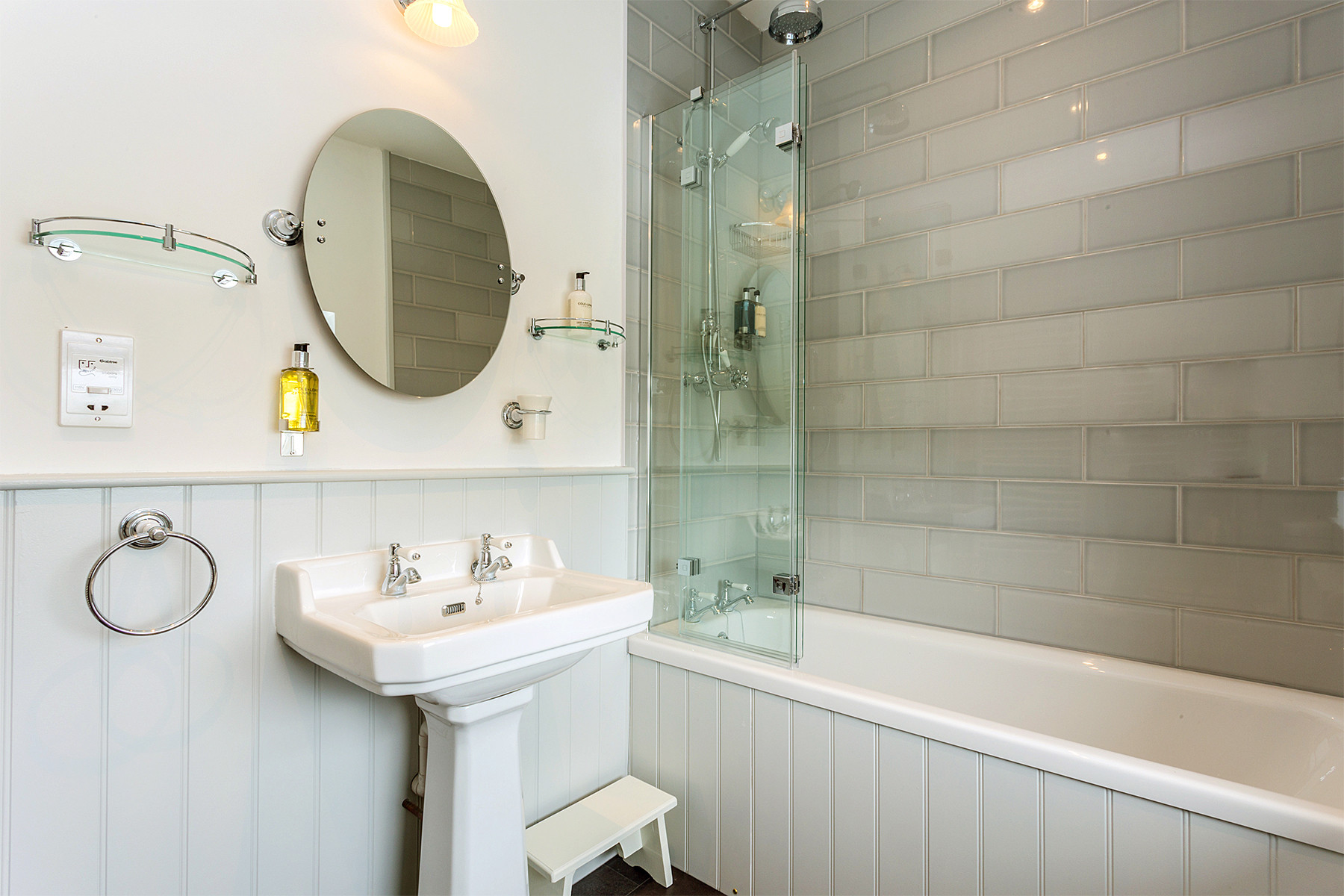 Family bathroom with shower over the bath 