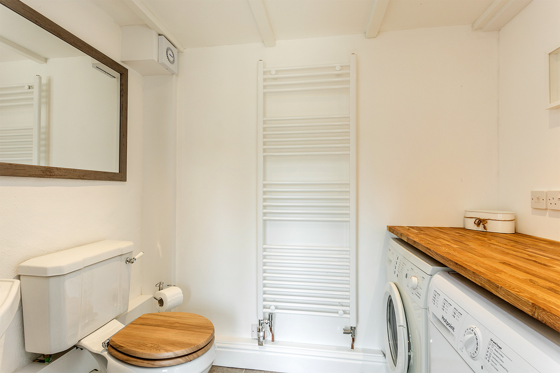 Ground floor utility room with washing machine, tumble dryer and w.c.