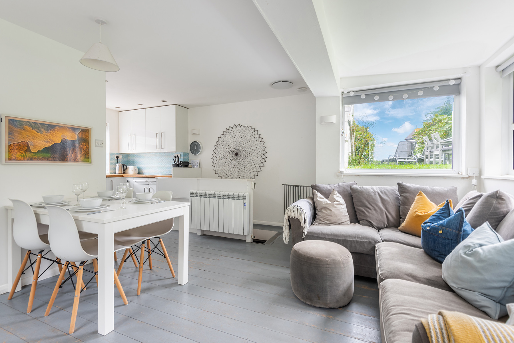 The open plan lounge and dining area, leading through to the kitchen.