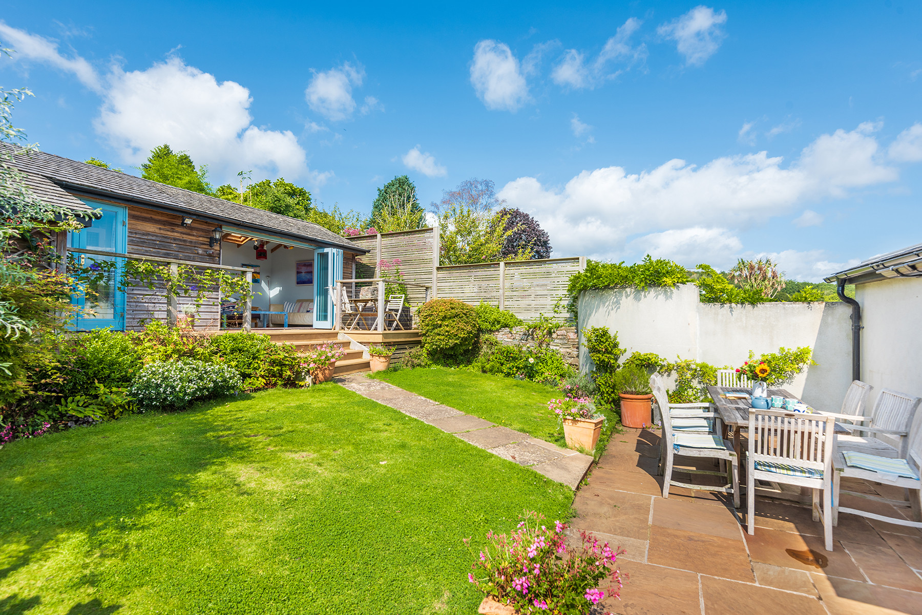 Back garden with studio at the rear, perfect for those looking to escape for a short while.