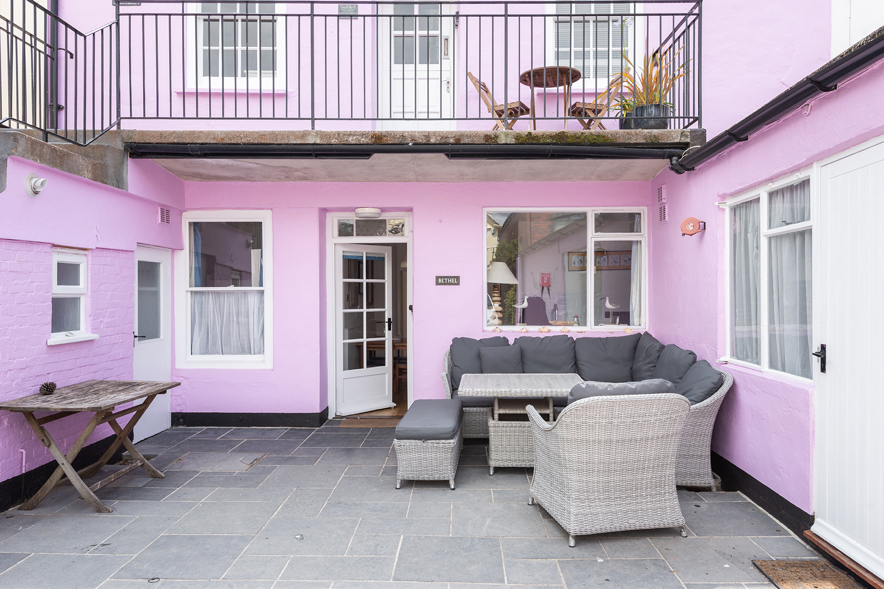 The rear patio area (by the parking area)