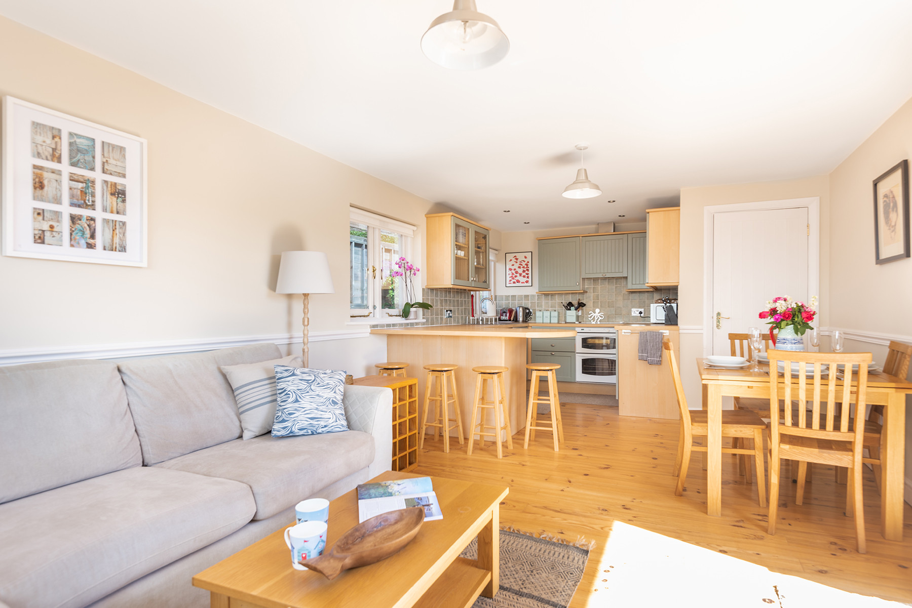 The open plan living space is ideal for coming together after a long day on the beach.