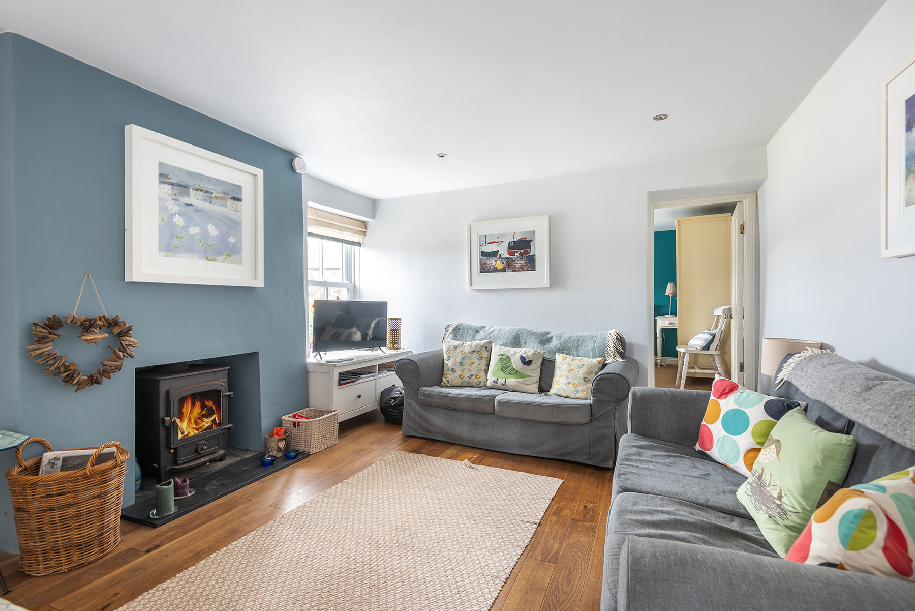 Living Area with cosy woodburner