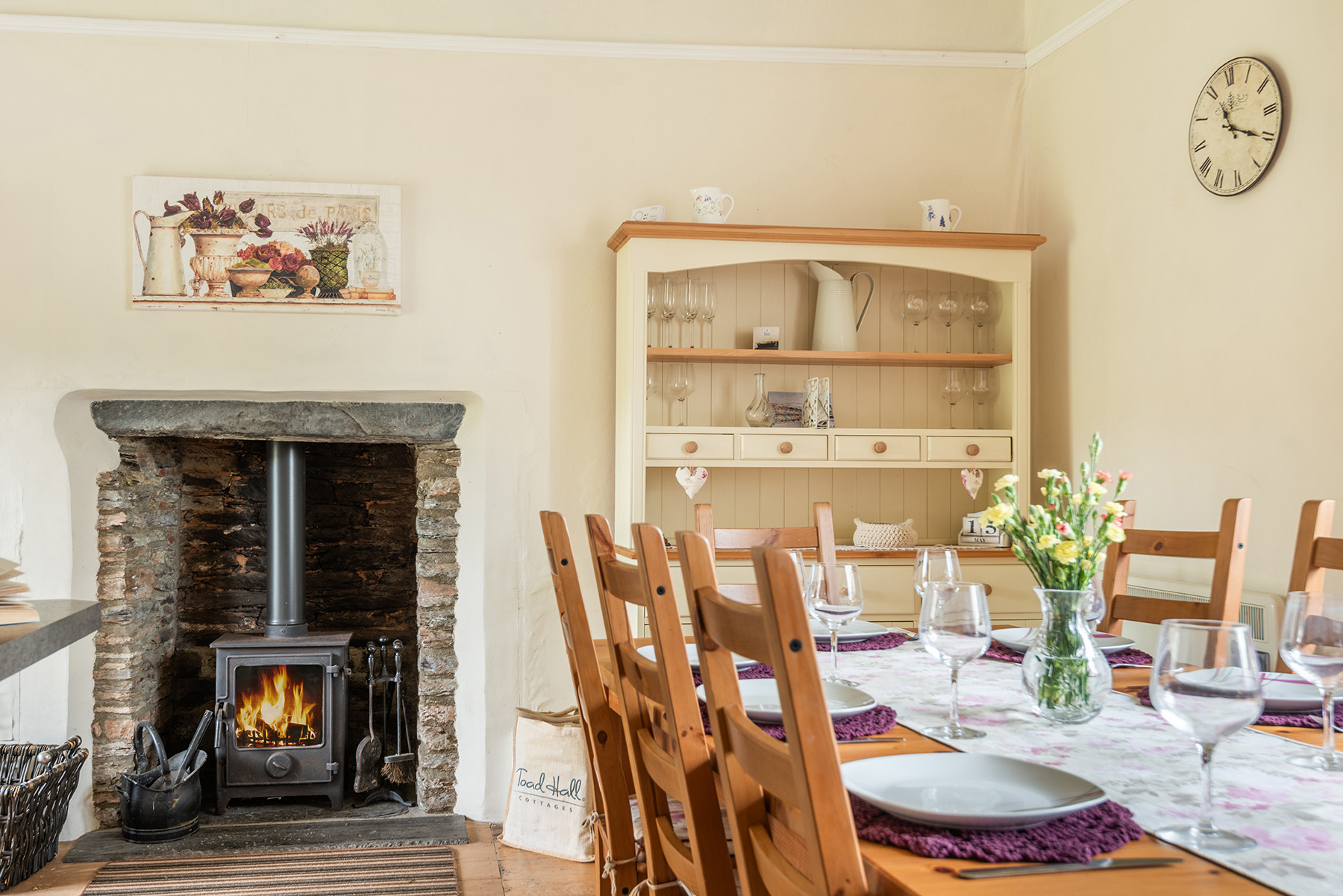 The dining area with a cosy log burner for winter meals with ambience.