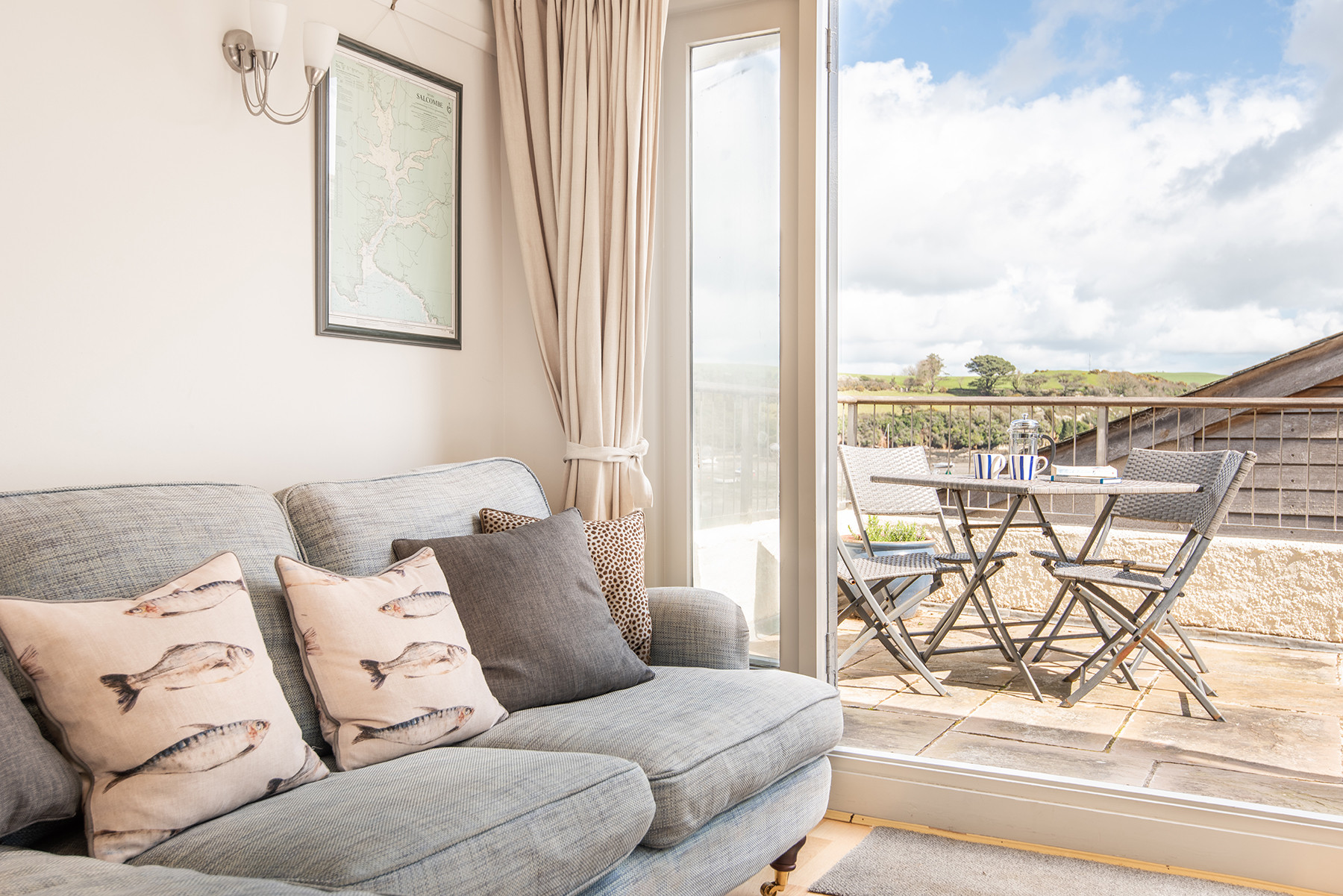 Cosy sitting room with french doors onto the sunny 1st floor balcony