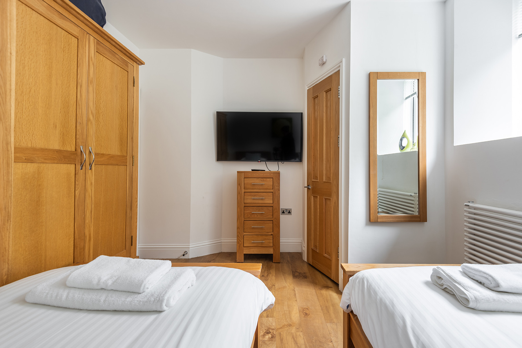 Bedroom 2 has a large TV