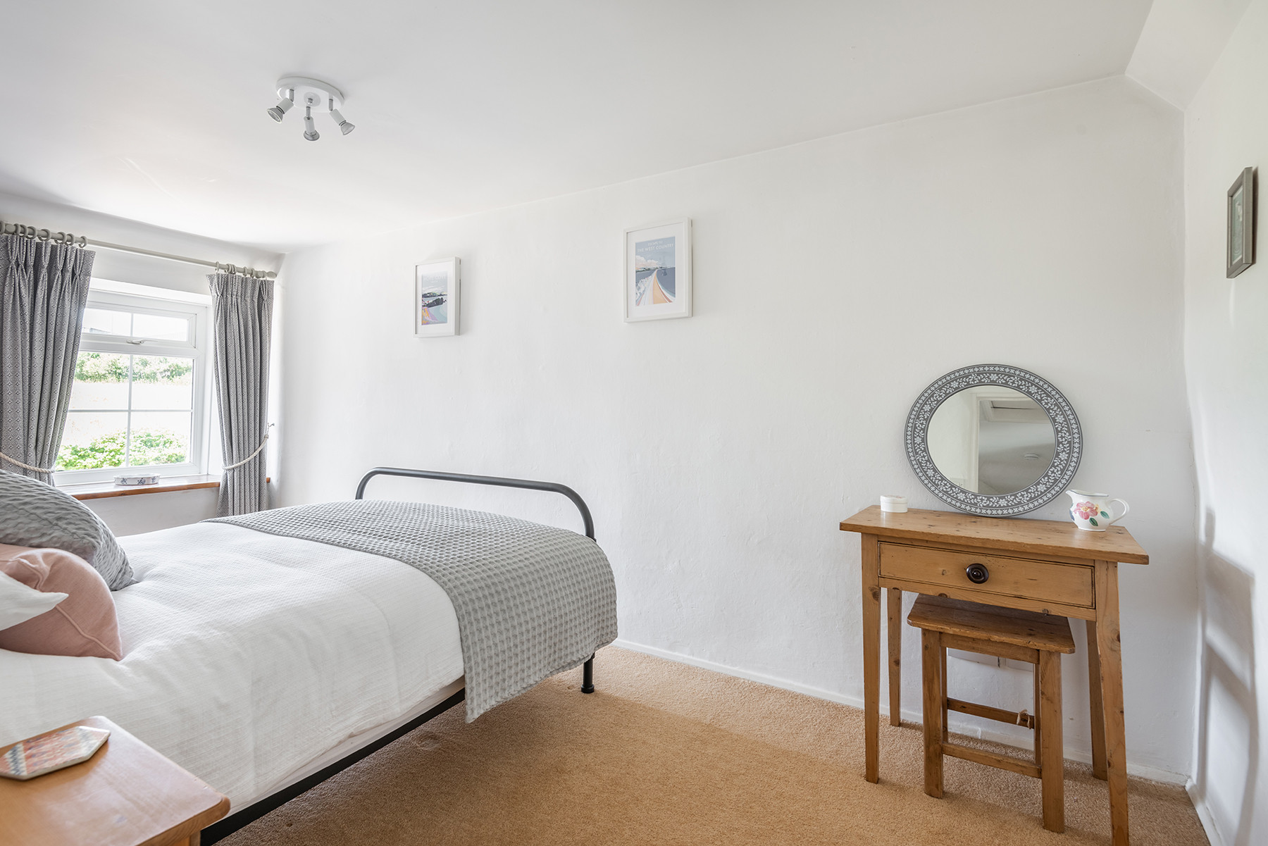 Bedroom 2 is light and airy