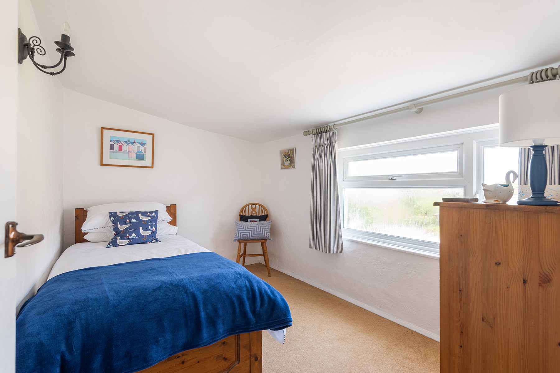 Another view of bedroom 3 with the single bed with trundle under