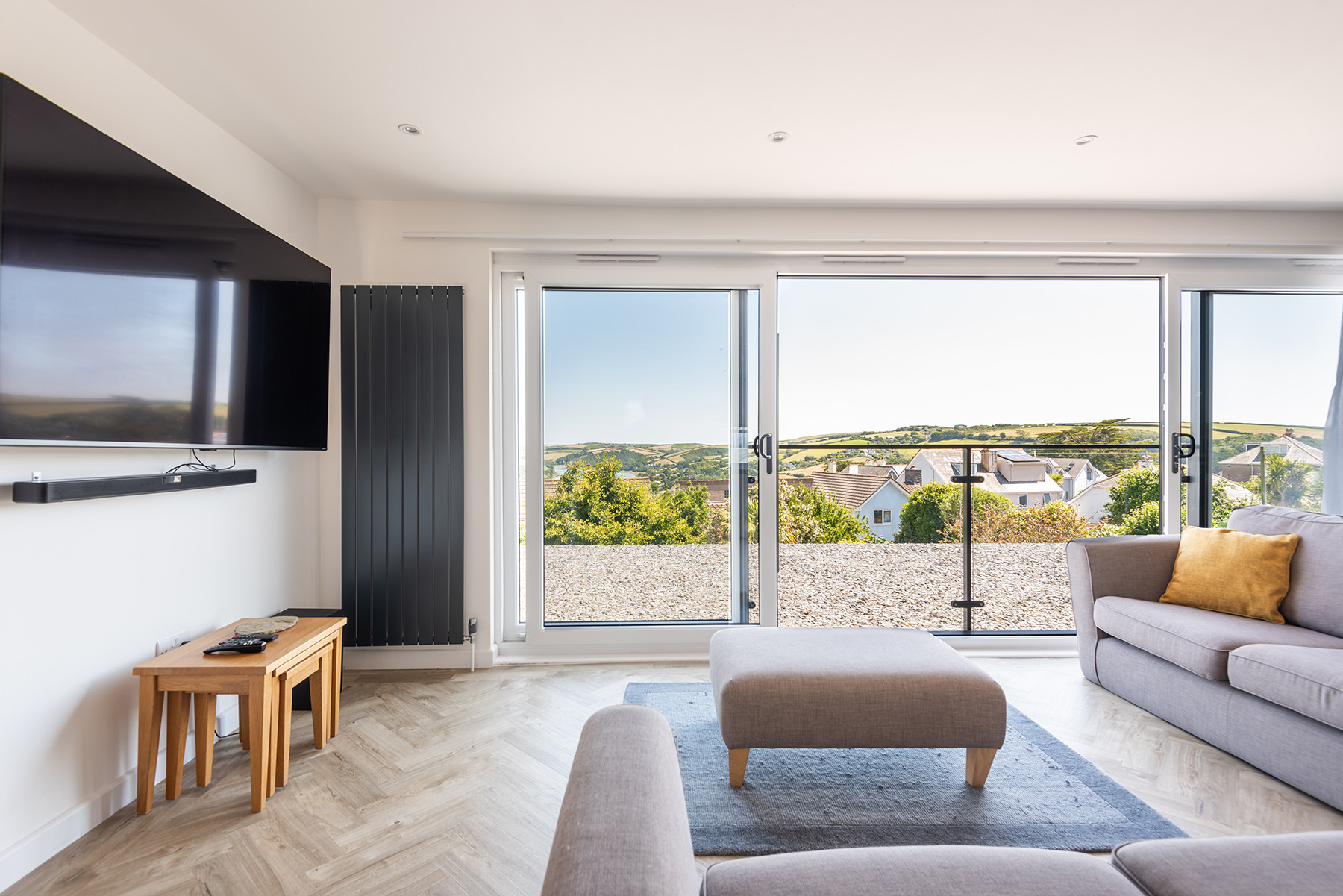 Seating area with 60 inch TV and sound bar