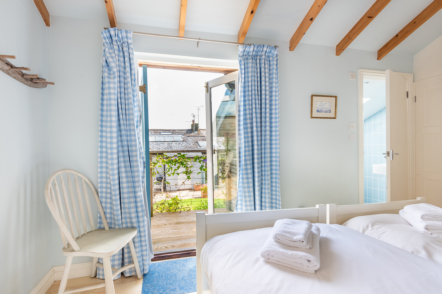 Studio bedroom with patio doors to terrace