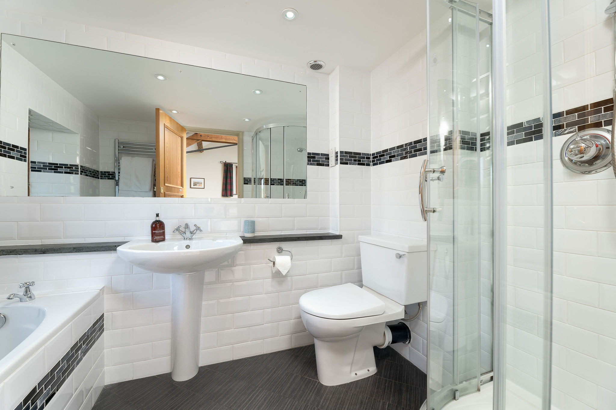 The en suite bathroom with separate shower cubicle.