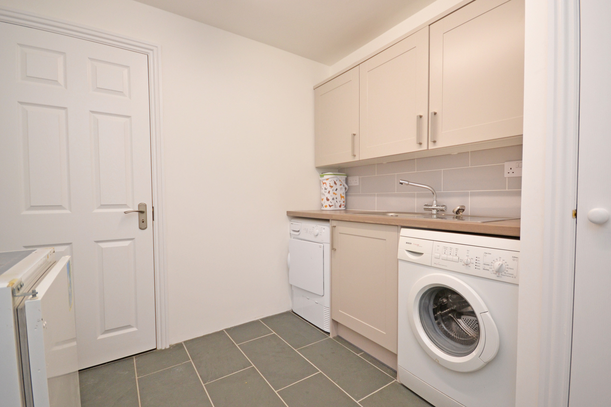 The utility room (accessed through the master bedroom).