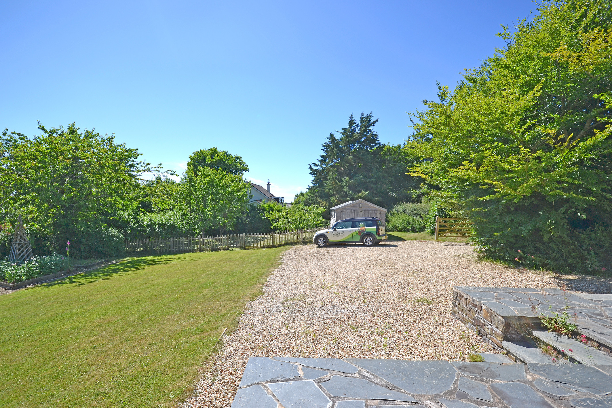 Garden and parking area.