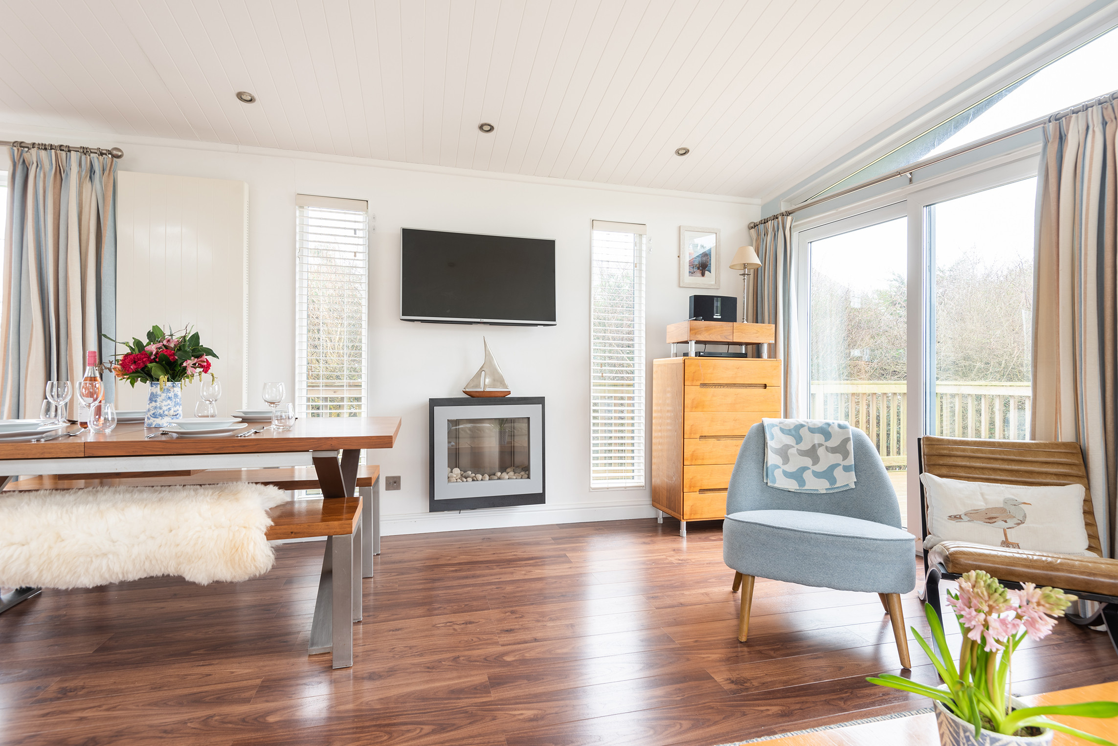The dining area. With table and bench seating.