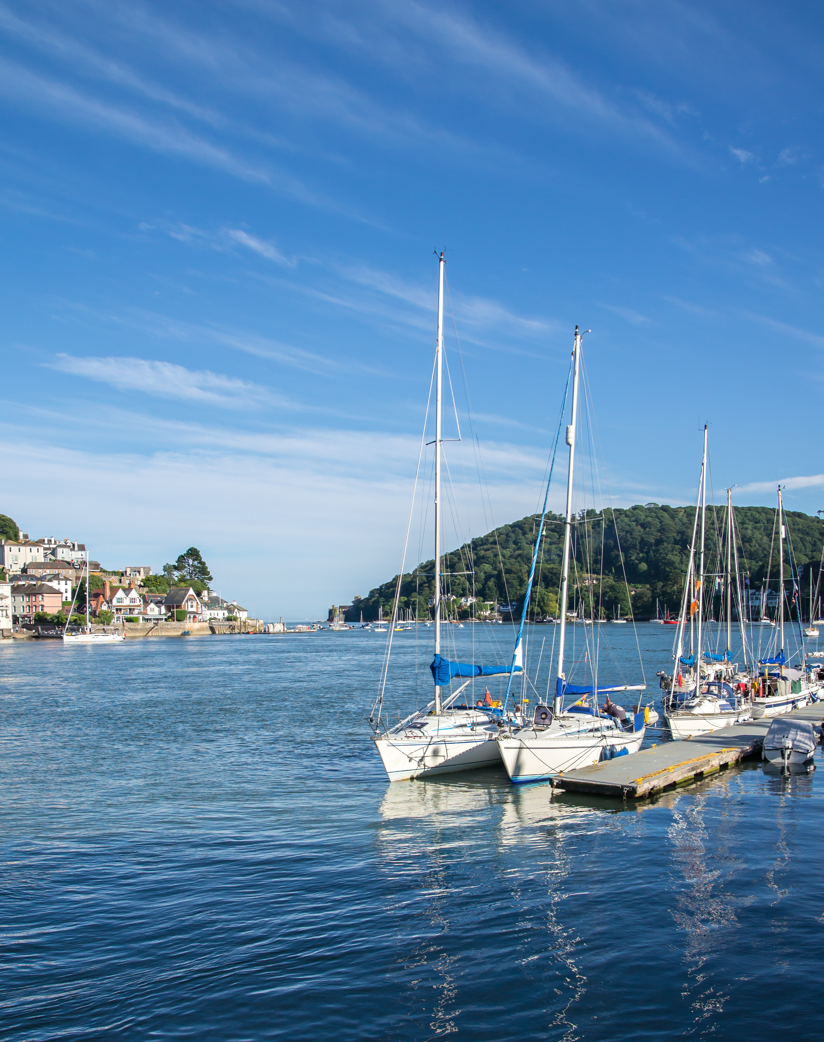 Boats moored by the embankment in Dartmouth