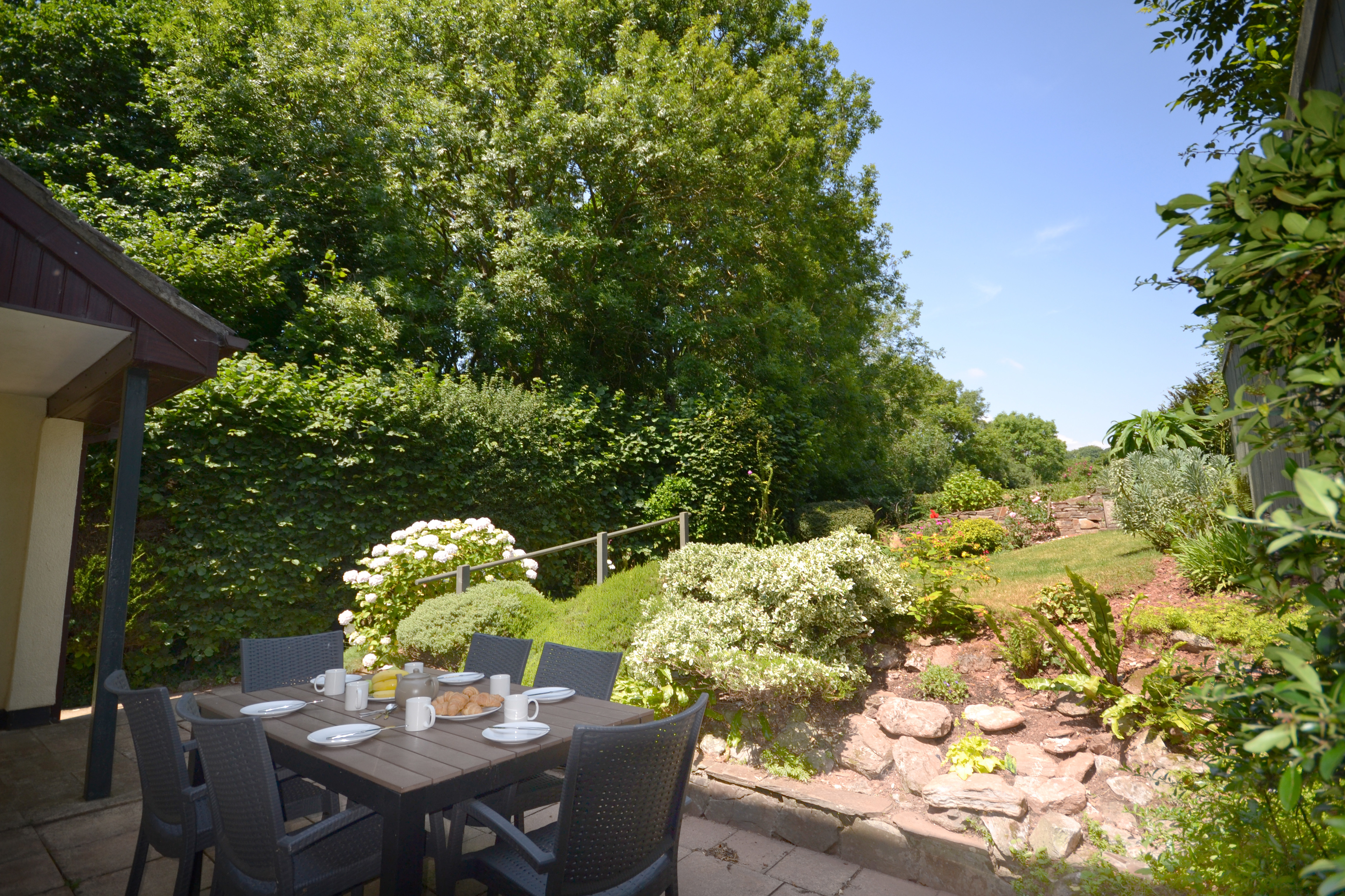 Dine al fresco at this tidy holiday home in South Devon