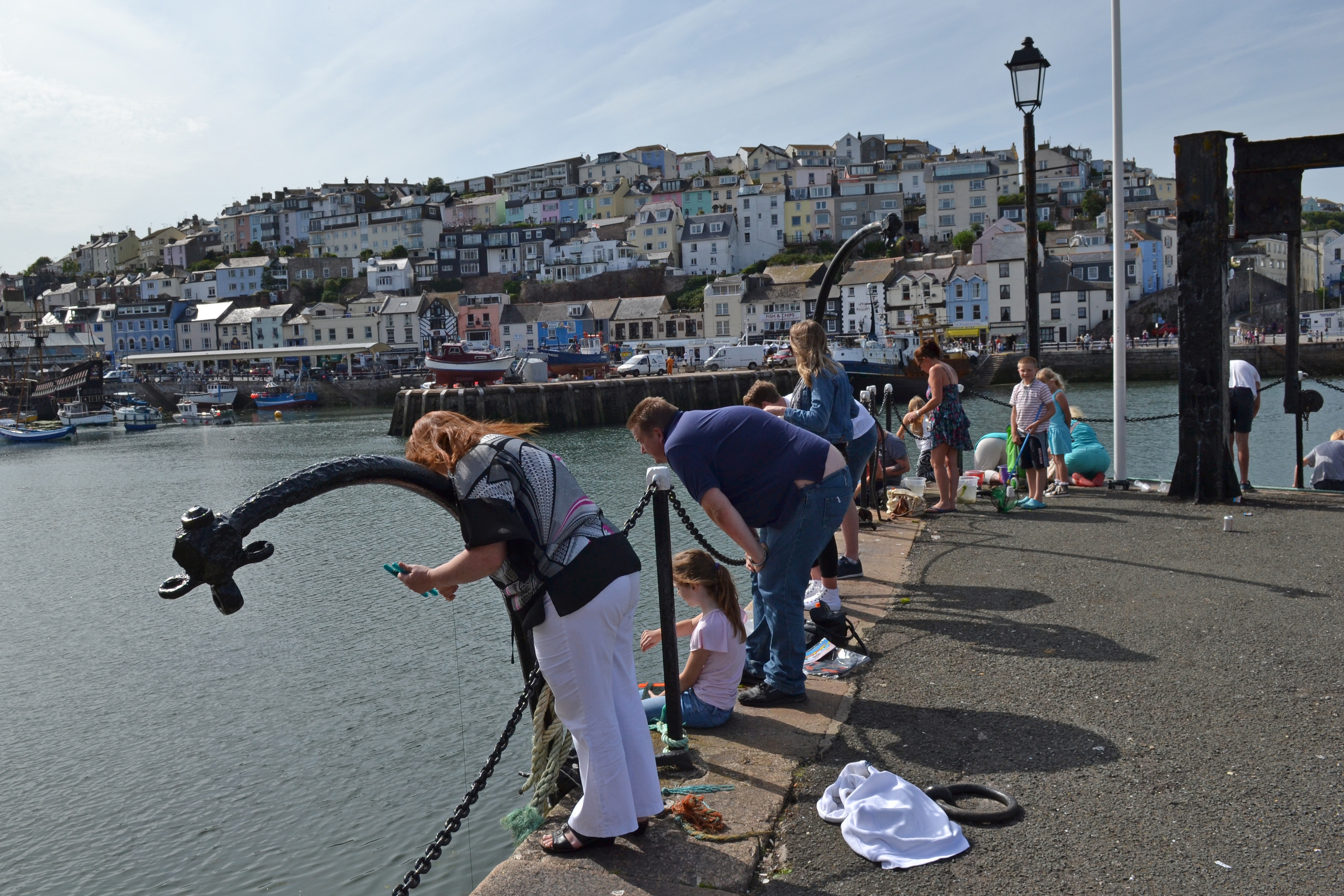Crabbing at Brixham Harbour.