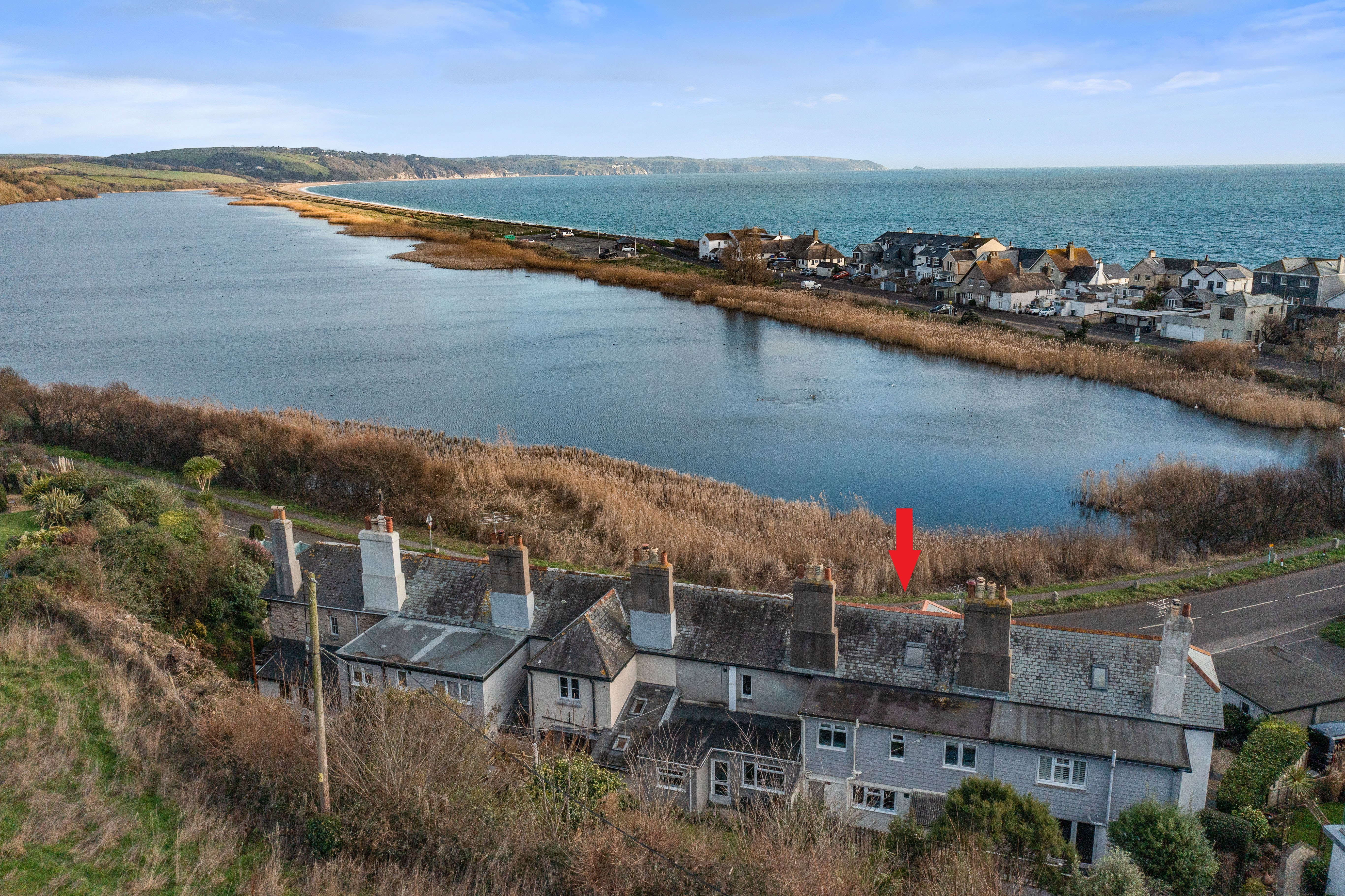 Nestled in the seaside village of Torcross on Slapton Sands, with views over the Slapton Ley Nature Reserve