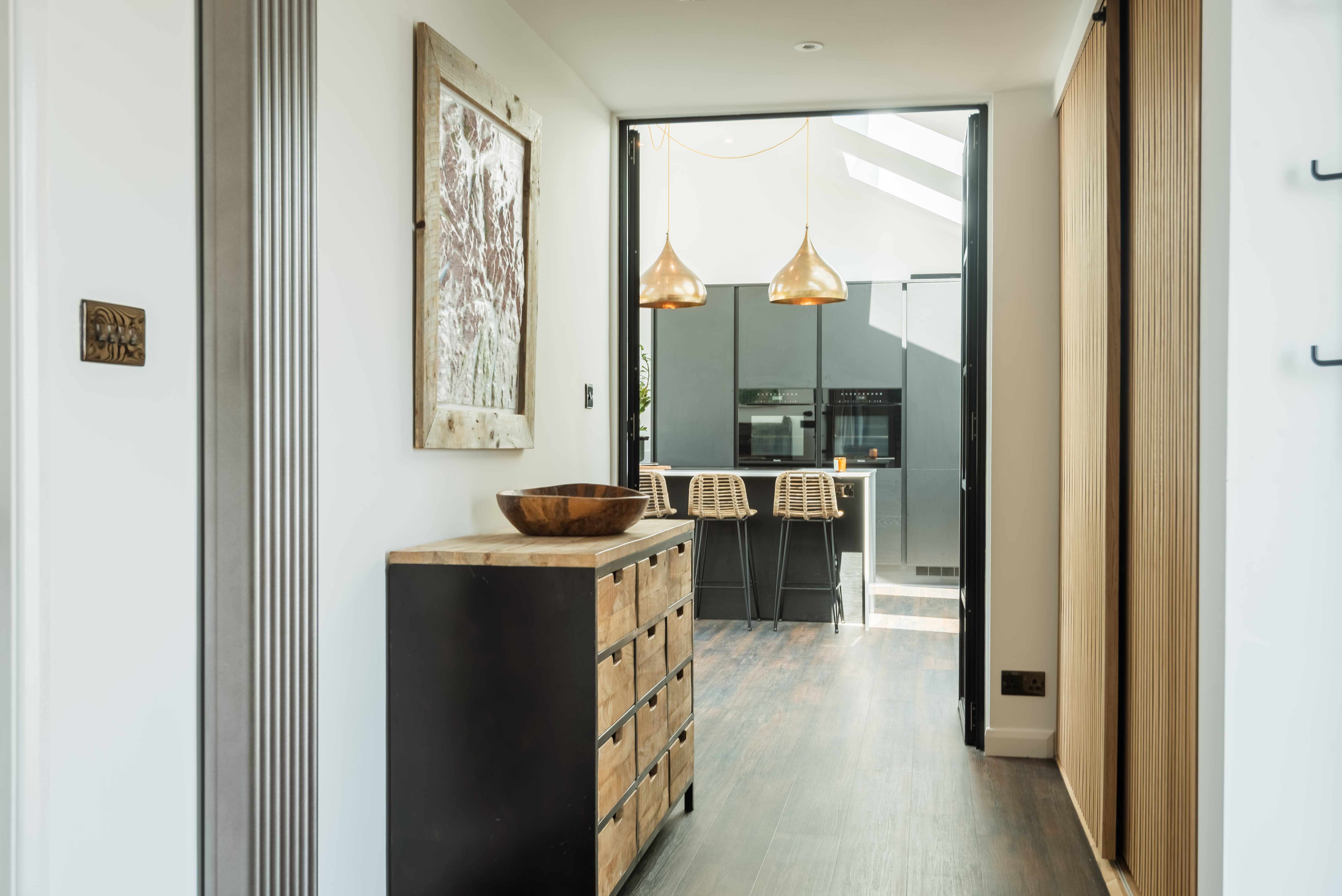 Peeking down to the beautiful kitchen diner in this 4 bed holiday home with views over the Salcombe and Kingsbridge estuary.