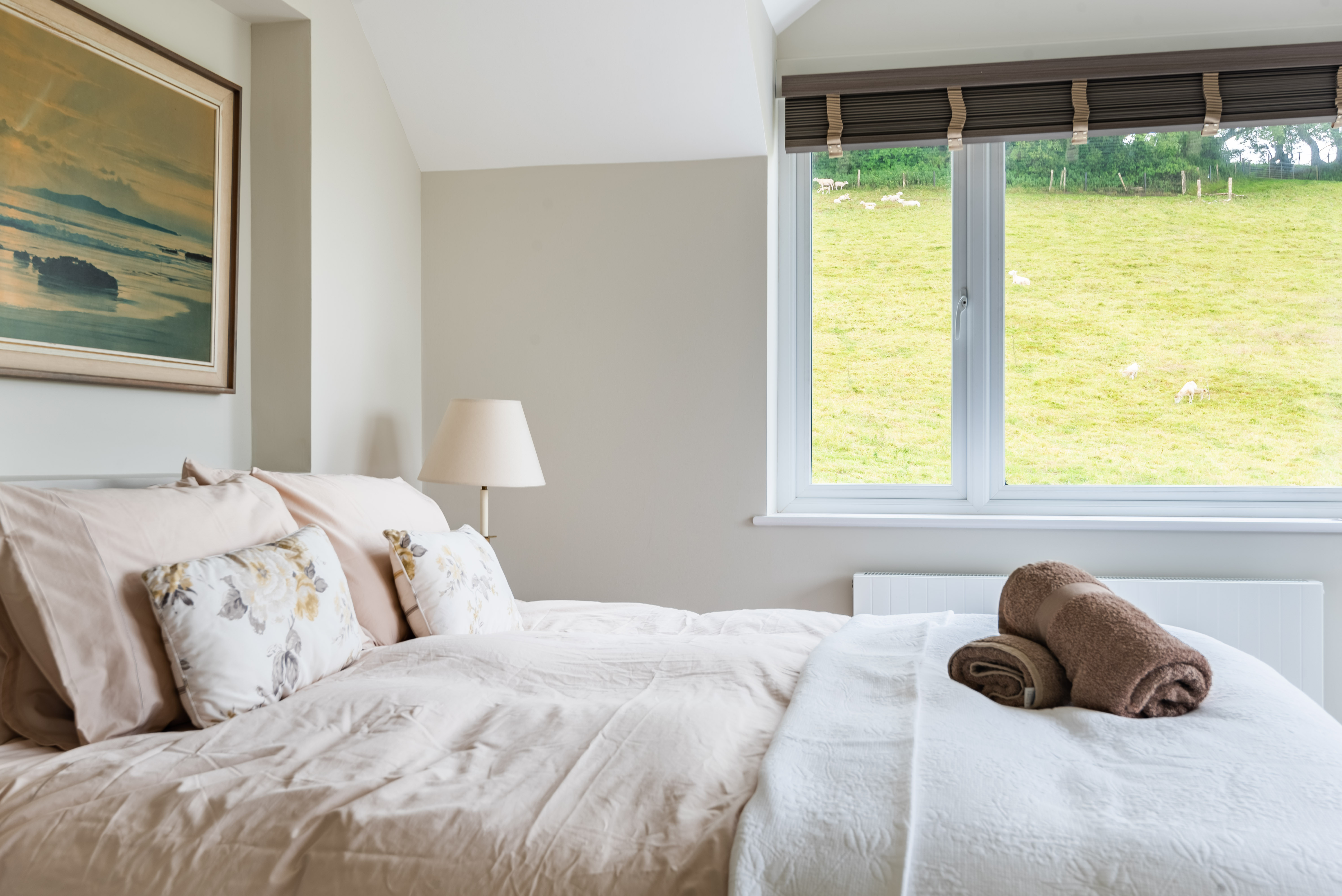 Bedroom 2-the master suite on the first floor with views across the village and countryside to Salcombe.