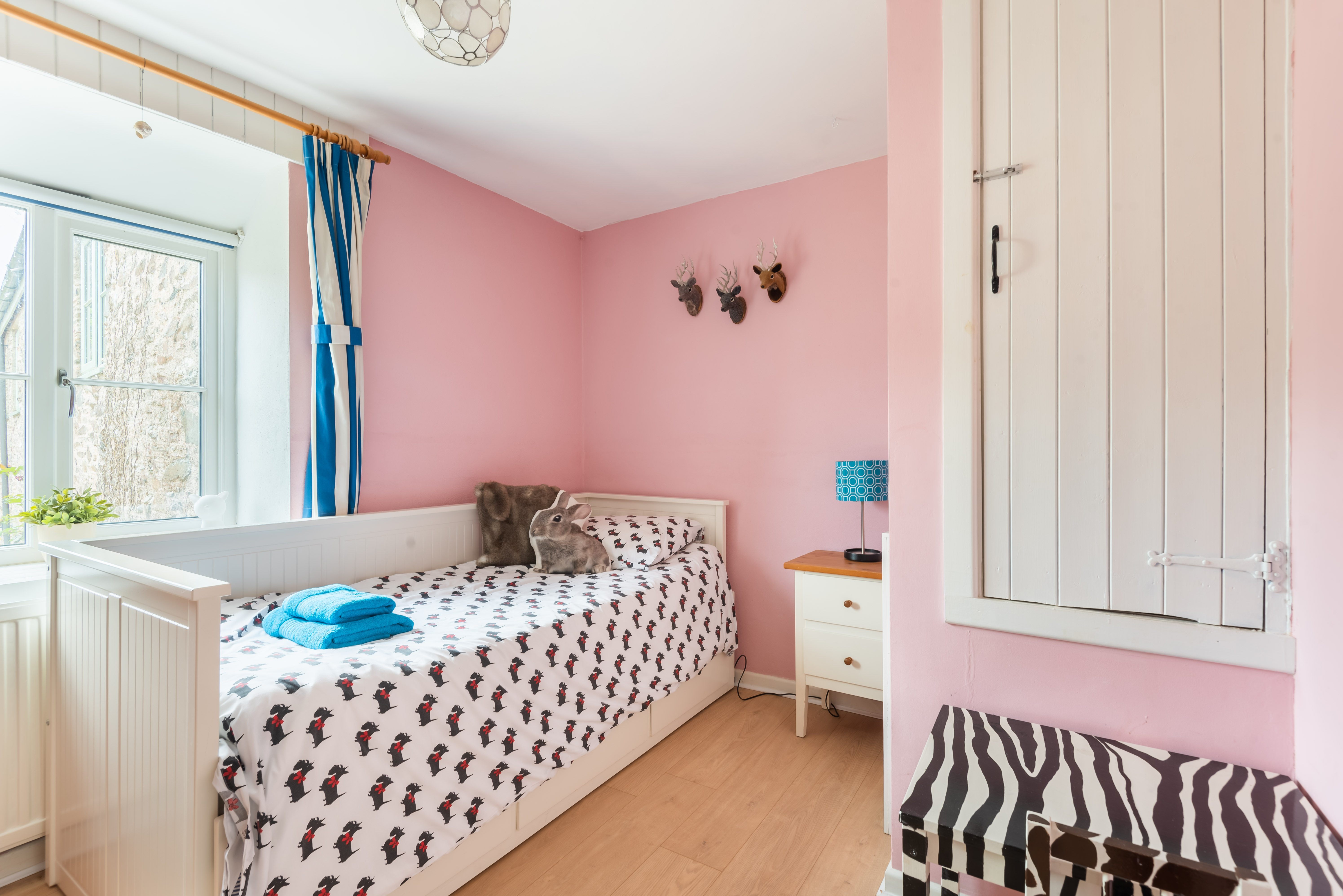 Bedroom 3 is pretty in pink