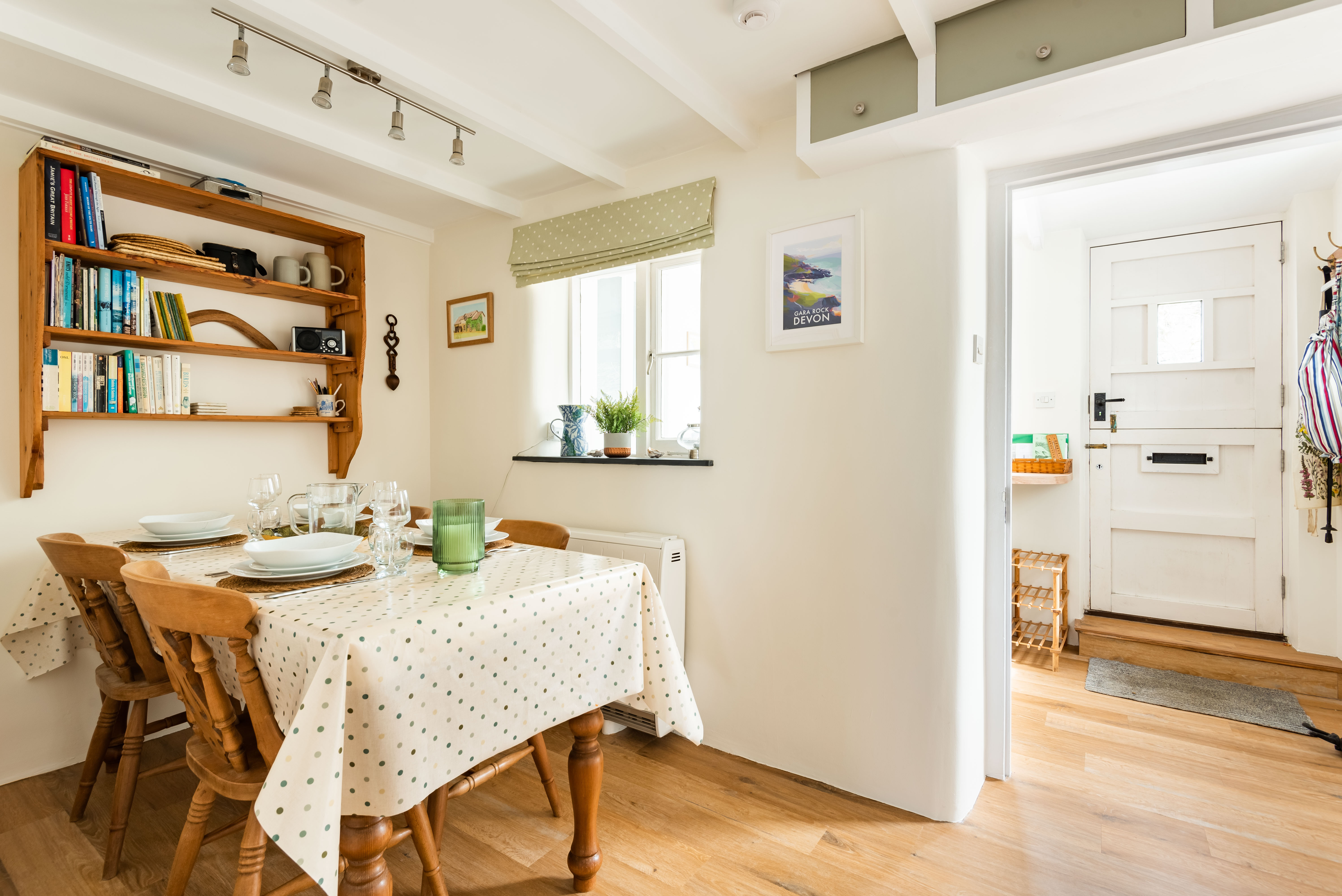 Another view of the dining area looking out to the utility
