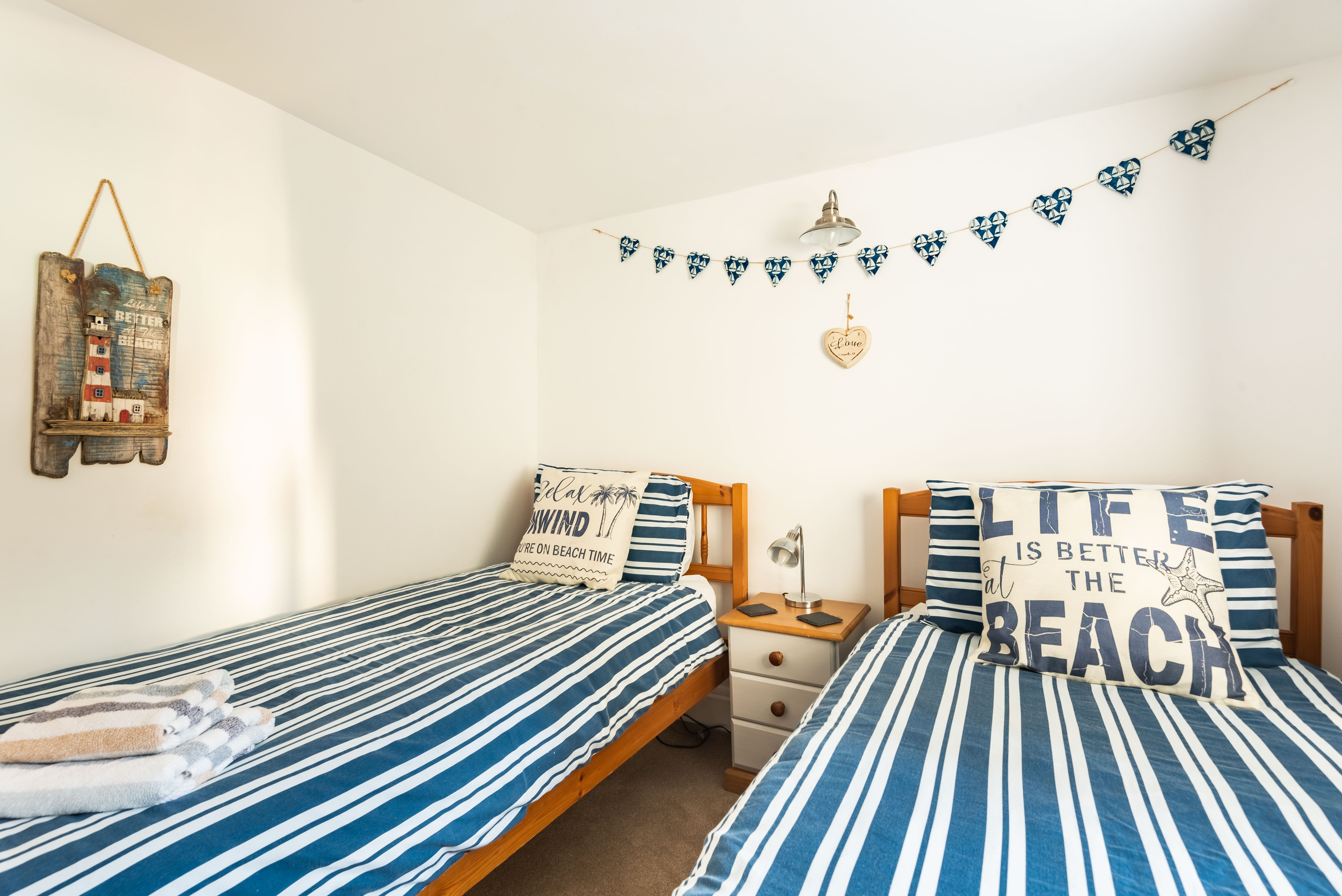 Bedroom 2 with twin beds at the rear of the property
