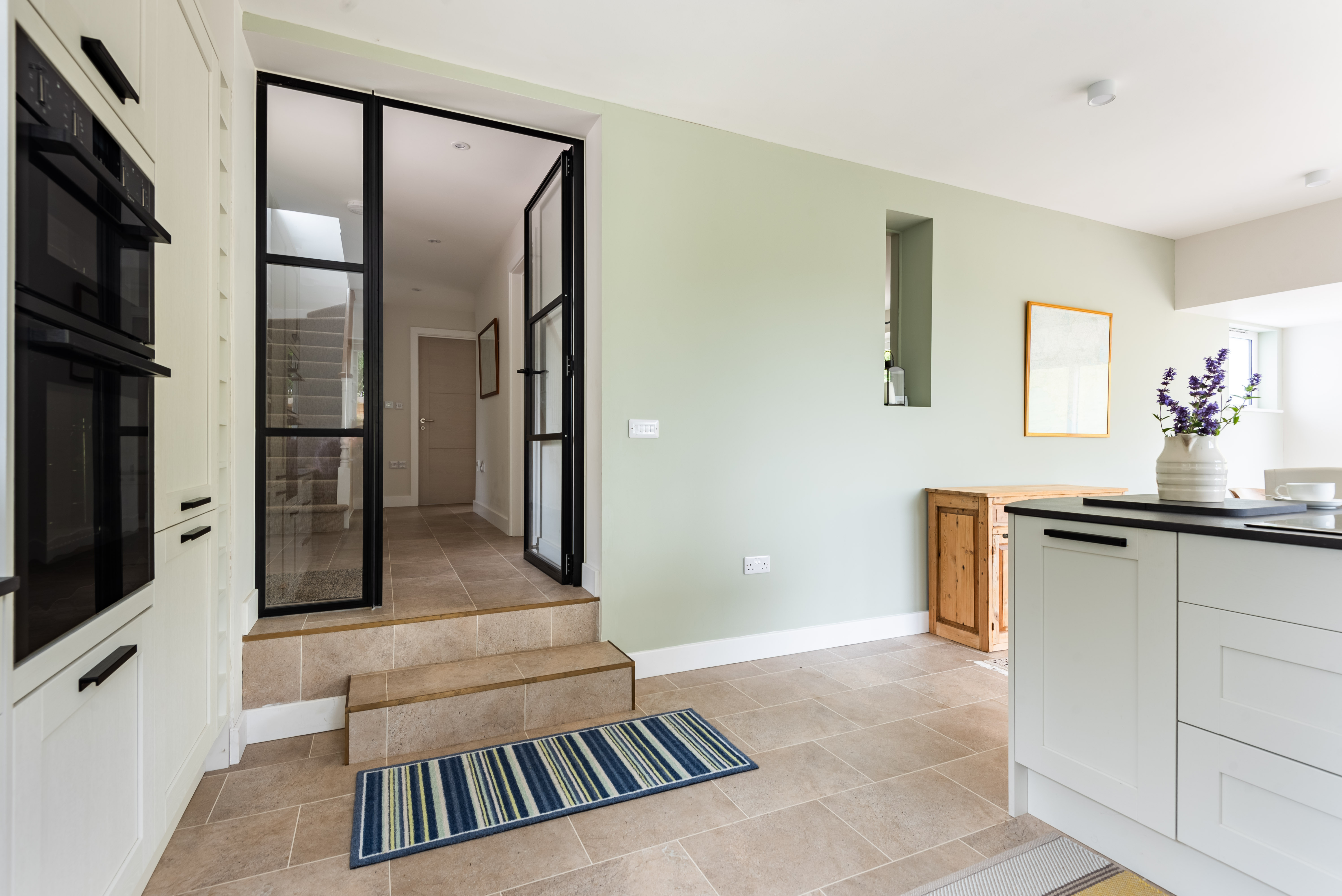 Step down from the hall into the spacious kitchen diner