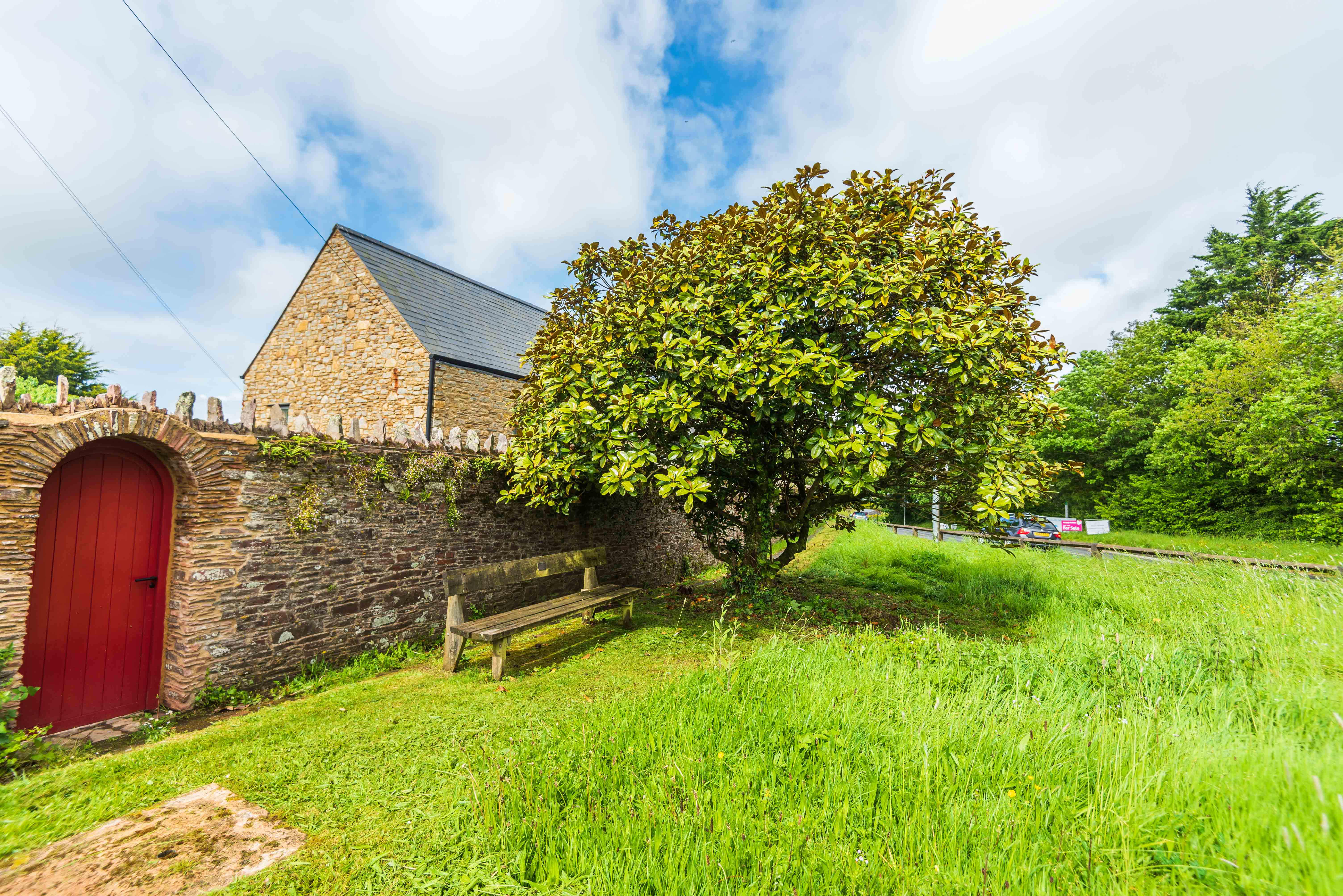 Red gate is the entrance to the property