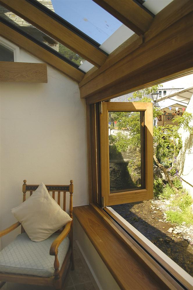 The pretty 'river room' conservatory off the kitchen